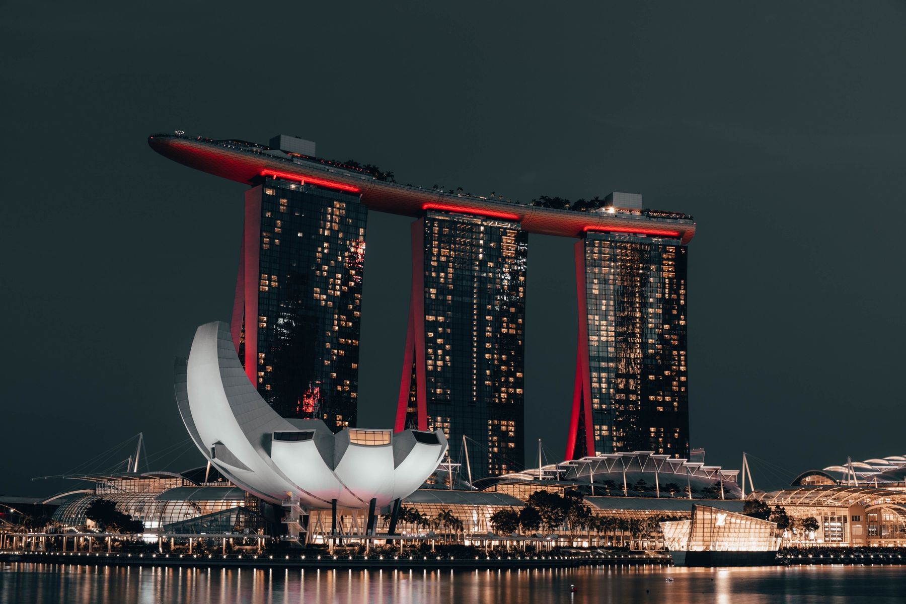 Marina Bay Sands at night with the ArtScience Museum in front
