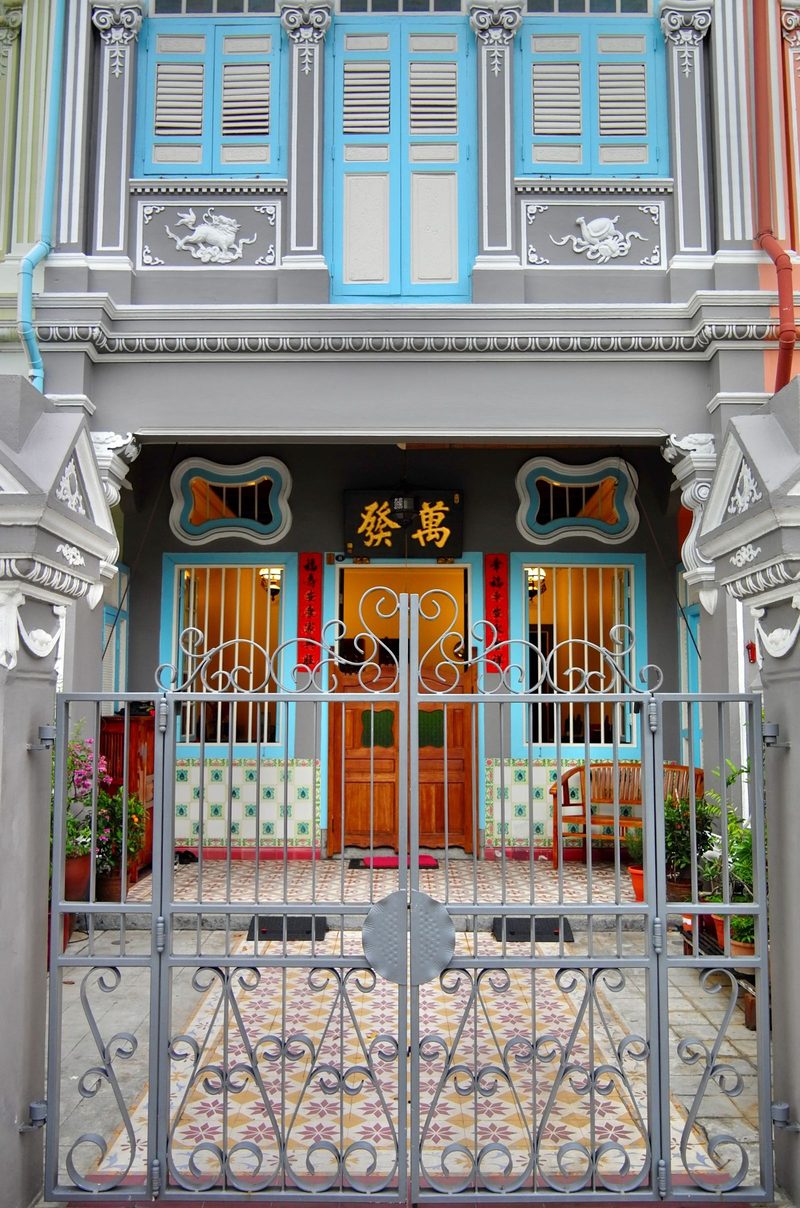 Vibrant Peranakan shophouse with intricate designs in Joo Chiat, Singapore.