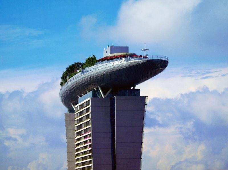 The Marina Bay Sands SkyPark against a clear blue sky in Singapore.